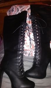 Black long legged boots
